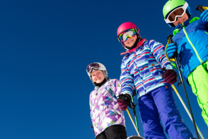 group of kids wearing ski gear