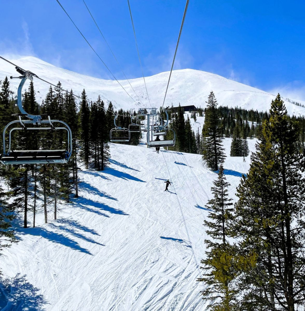 person riding ski lift