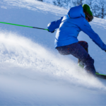 person skiing down mountain