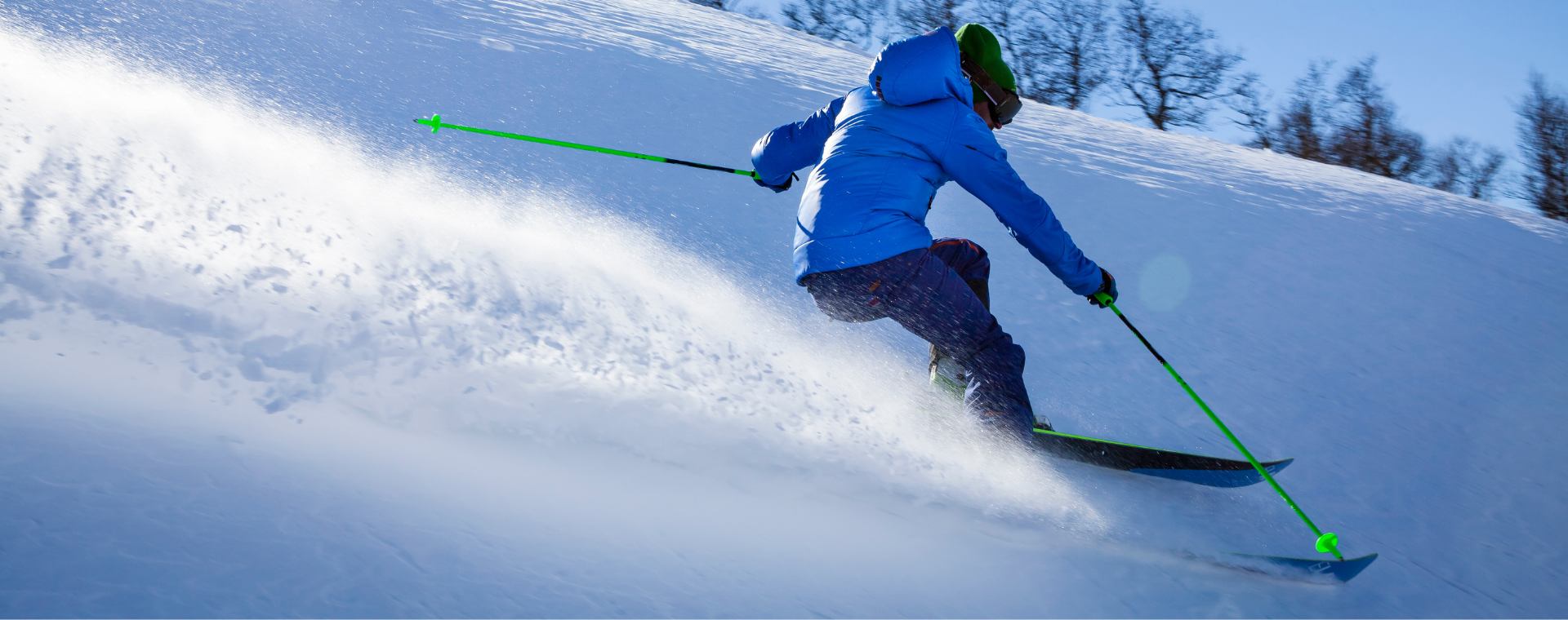 person skiing down mountain