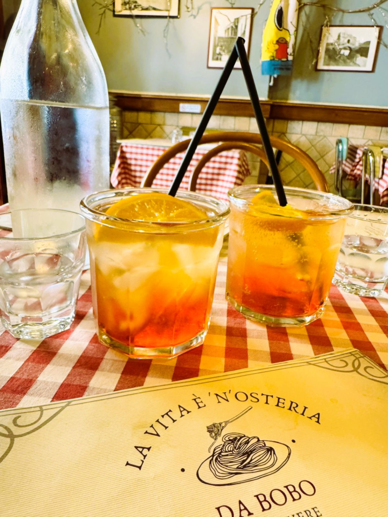 two drinks at a restaurant in rome